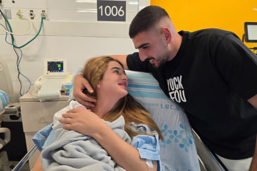 Man and wife in hospital bed